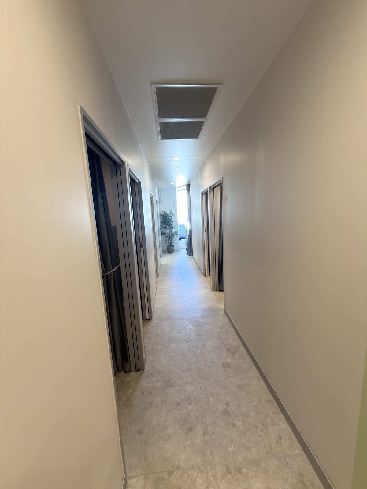 The treatment room corridor at Aurea Day Spa, formed by the new partition walls