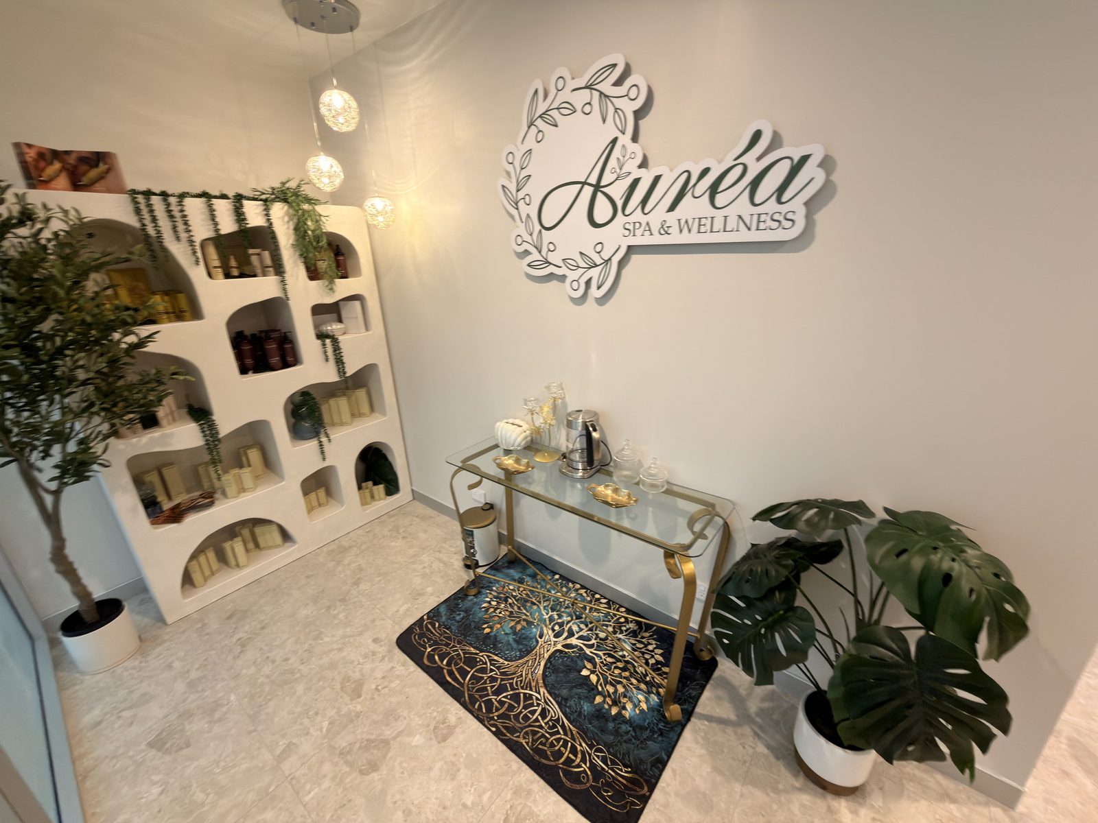 The retail display wall at Aurea Day Spa