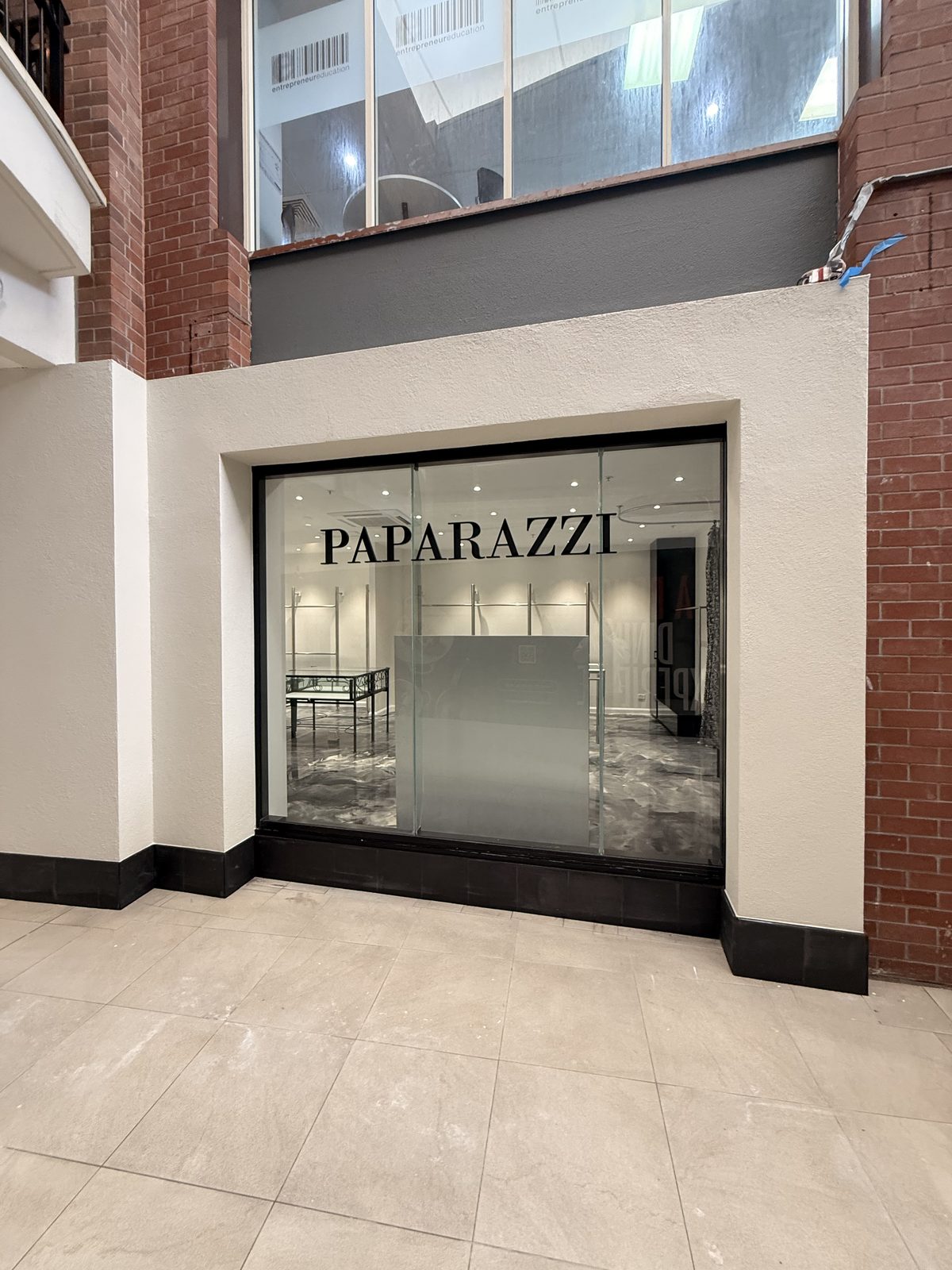 Paparazzi shopfront window and signage from the mall
